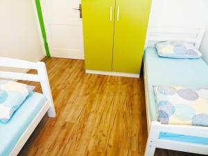 Postel nebo postele na pokoji v ubytování Chillax Rooms