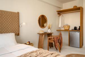 álas cycladic suites客房内的一张或多张床位
