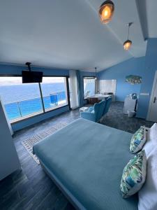 Ein Bett oder Betten in einem Zimmer der Unterkunft Fener Hotel Café & Kahvalti