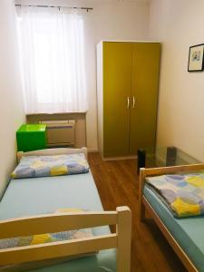 Postel nebo postele na pokoji v ubytování Chillax Rooms