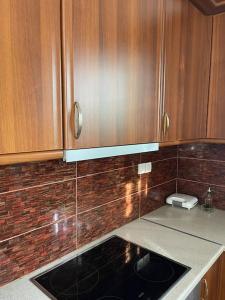 Kuchyň nebo kuchyňský kout v ubytování Marias House Rafina