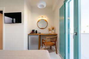 álas cycladic suites客房内的一张或多张床位