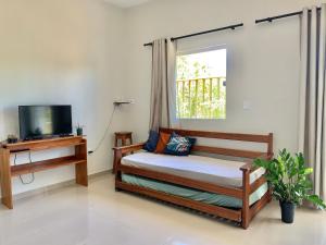 En eller flere senge i et værelse på Colibri