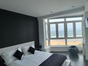 Кровать или кровати в номере Apartamento Escalera 9
