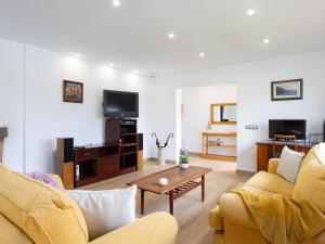 a living room with two couches and a tv at Holiday Home Borges Fuente by Interhome in La Orotava