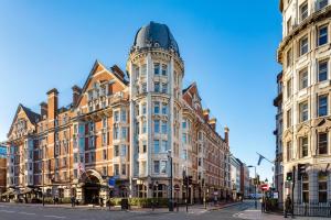 a tall building with a dome on top of it at Radisson Blu Hotel, London Bloomsbury in London