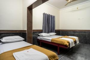Fotografie z fotogalerie ubytování RajGaurav Lodging v destinaci Kolhápur