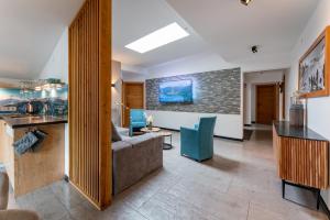 Telewizja i/lub zestaw kina domowego w obiekcie Alm Appartements ZellamSee