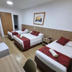 Postel nebo postele na pokoji v ubytování Max Hotel