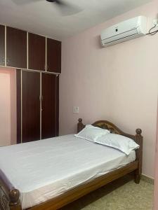 Katil atau katil-katil dalam bilik di Madurai Home Stay