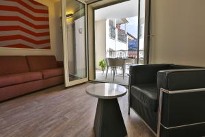 Posezení v ubytování Hotel Al Campanile - Luxury Suites & Apartments