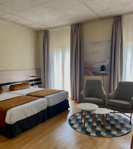 Postel nebo postele na pokoji v ubytování Balneario de la Albotea + 30 fotografií