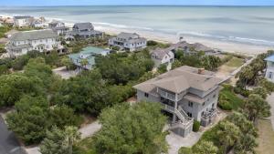 an aerial view of a house with the beach at Maison Blanche home by Peace Vacations in Georgetown