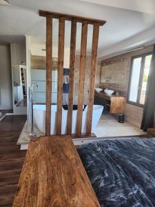 Postel nebo postele na pokoji v ubytování L'Apt Tropez