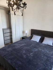 Postel nebo postele na pokoji v ubytování L'Apt Tropez