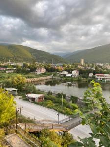 a view of a river with a town and a city at Eco Art House in Vanadzor