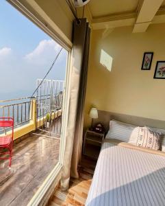 Balkón nebo terasa v ubytování Aizawl Hotel