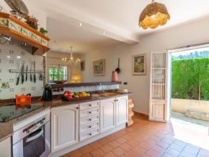 A kitchen or kitchenette at Villa La Font by Interhome