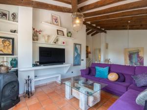 A television and/or entertainment centre at Villa La Font by Interhome