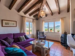 A seating area at Villa La Font by Interhome