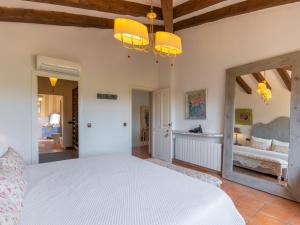 A bed or beds in a room at Villa La Font by Interhome