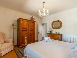 A bed or beds in a room at Villa La Font by Interhome