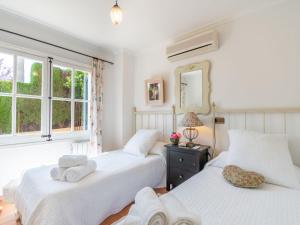 A bed or beds in a room at Villa La Font by Interhome