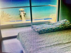 Duplex 1 Fila Vista Bahía Paracas - Sotavento 501 T3客房内的一张或多张床位