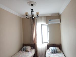 Letto o letti in una camera di guest house come