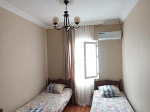 Letto o letti in una camera di guest house come