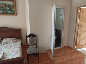 Letto o letti in una camera di guest house come