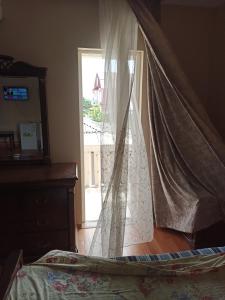 Letto o letti in una camera di guest house come