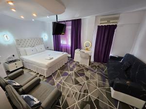 Postel nebo postele na pokoji v ubytování Amethyst House Therme & Bucharest Otopeni Airport