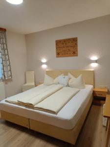 Postel nebo postele na pokoji v ubytování Ronalds Appartements
