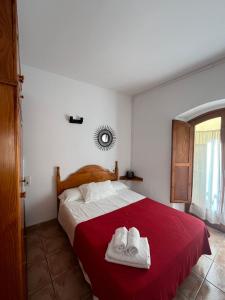 Postel nebo postele na pokoji v ubytování APARTAMENT CAN MINGU 1er pis