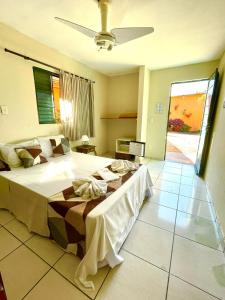 En eller flere senge i et værelse på Pousada Villa Três + 78 billeder