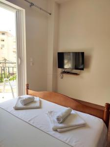 Postel nebo postele na pokoji v ubytování Duka Rooms