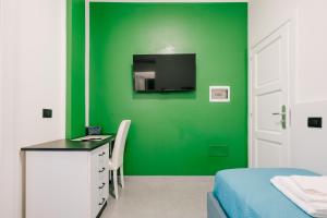 TV a/nebo společenská místnost v ubytování B&B Insonnyroom