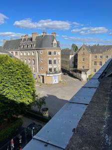 an overhead view of a city with buildings at Appartement rénové tout équipé, centre ville, proche de la gare et commerce in Flers