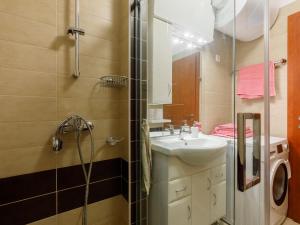 a bathroom with a sink and a shower at Apartment Lily by Interhome in Balatonfüred +24 photos
