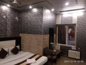 Koupelna v ubytování Hotel Pardesi,Har ki pauri Road Haridwar + 37 fotografií