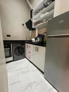 Dapur atau dapur kecil di Family Appart