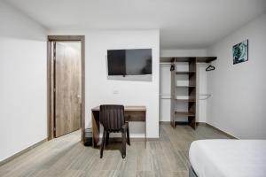 Postel nebo postele na pokoji v ubytování Xliving Host and Rooms + 11 fotografií