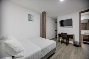 Postel nebo postele na pokoji v ubytování Xliving Host and Rooms