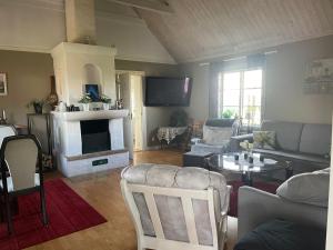 Posezení v ubytování Kapelludden Östra Öland
