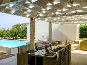 The swimming pool at or close to Holiday Home Barbara by Interhome