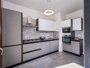 Kuchyňa alebo kuchynka v ubytovaní Villa Rocchi Livreri by Interhome + 22 fotografií