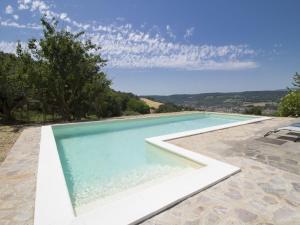 The swimming pool at or close to Holiday Home Casale Del Re by Interhome
