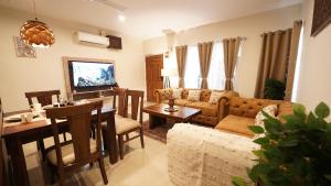TV a/nebo společenská místnost v ubytování Walisons Homestay Abelia