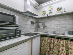 Kuchyň nebo kuchyňský kout v ubytování Holiday Home Montaleo by Interhome